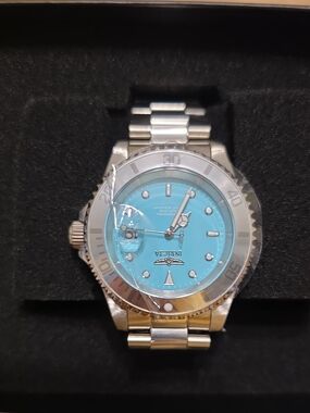 Invicta Stainless Steel Watch with Turquoise Dial and Silver Bezel
